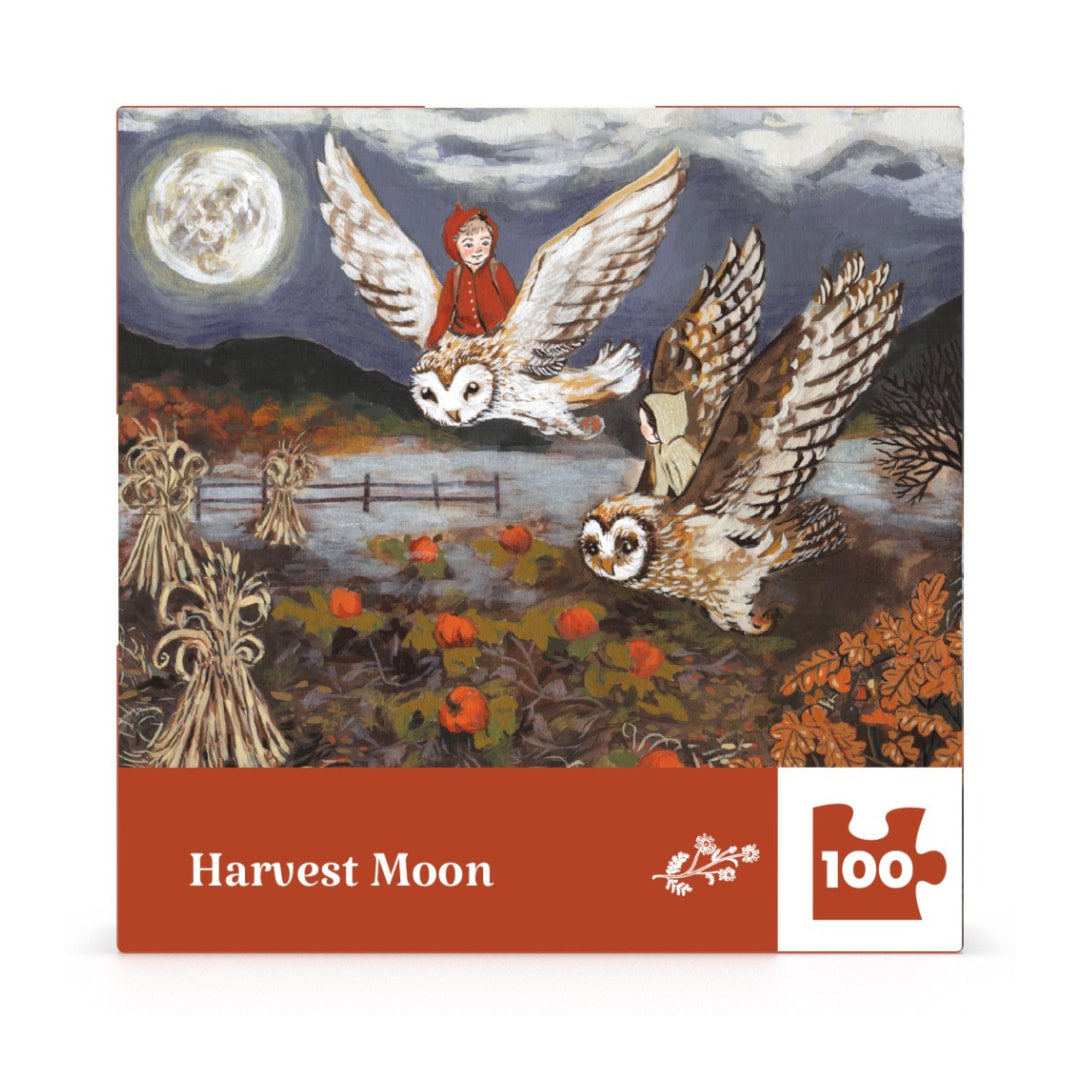 Jigsaw puzzle box titled 'Harvest Moon' with owl design on a white background