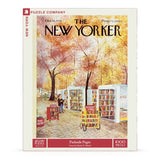 New York Puzzle Company puzzle box featuring 'The New Yorker' magazine cover with a person and book cart.