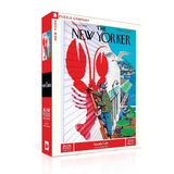 New York Puzzle Company puzzle box with a colorful illustration of a man painting a large red lobster.