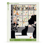Jigsaw puzzle box featuring a New Yorker magazine cover with a silhouette of  cat by a window.