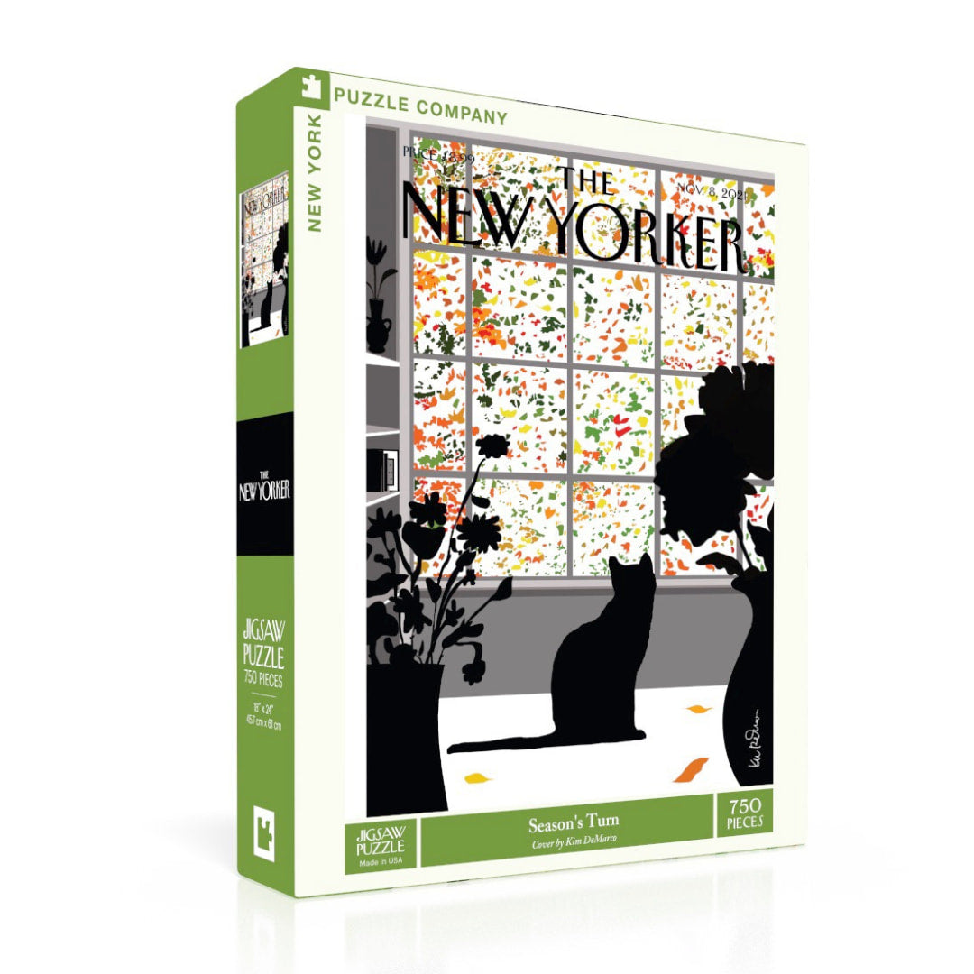 Jigsaw puzzle box featuring a cat and person silhouette by a window with a falling leaf pattern, New York Puzzle Company branding.