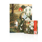 Jigsaw puzzle packaging with a garden scene design on a white background