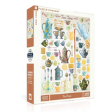 Puzzle box with tea-themed illustrations and 'New York Puzzle Company' branding.