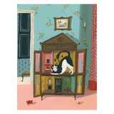 A whimsical illustration of a black-and-white cat lounging inside an open wooden cabinet or toy house, set in a pastel room with pink walls, floral wallpaper, and a red patterned curtain.