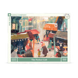 Jigsaw puzzle packaging with a winter scene illustration and 'The Perfect Gift' text.