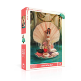 Jigsaw puzzle box with a woman in an oyster shell  design on a white background