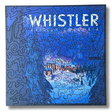 Jigsaw puzzle with 'Whistler, British Columbia' text and mountain scene