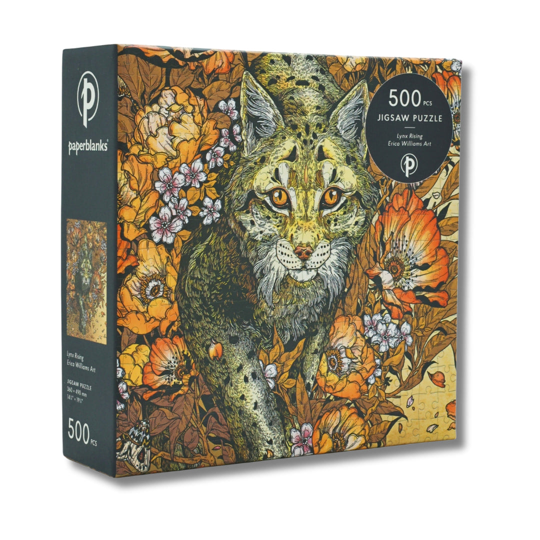 Jigsaw puzzle box with a lynx and floral design on a white background