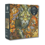 Jigsaw puzzle box with a lynx and floral design on a white background