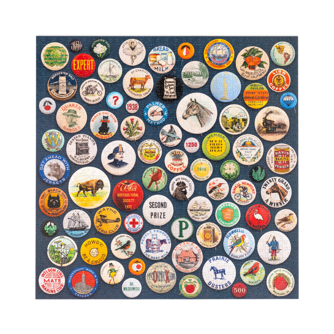 Completed jigsaw puzzle of vintage-style buttons on a blue background