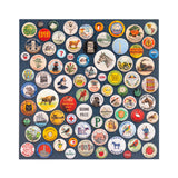 Completed jigsaw puzzle of vintage-style buttons on a blue background