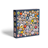 Jigsaw puzzle box of a collection of vintage-style buttons on a blue box with a white background