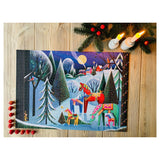 Decorative Christmas scene with Santa Claus and reindeer on a wooden surface with candles and greenery.