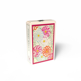 A mini puzzle box with a floral pattern on the front and spine, photographed on a clean white background. The box is cream-colored with a pink border and multicolored flowers including pink, orange, blue, and white.