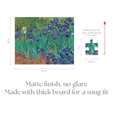 Jigsaw puzzle packaging with Van Gogh 'Irises' design, size dimensions, and matchstick for scale.