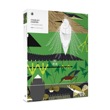 The puzzle box for 'The Everglades' by Charley Harper, featuring a stylized illustration of a white egret against a green background with other birds and landscape elements.