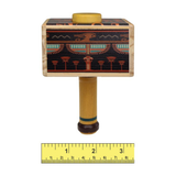 Wooden toy mace puzzle box with Egyptian design on a white background, accompanied by a ruler for scale.