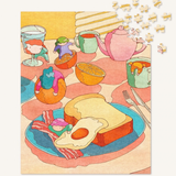 A colorful illustrated breakfast scene with a plate of toast, bacon, and a fried egg, a pink teapot, mugs, and small character figures, with a few puzzle-piece graphics floating in the top right on a light neutral background.