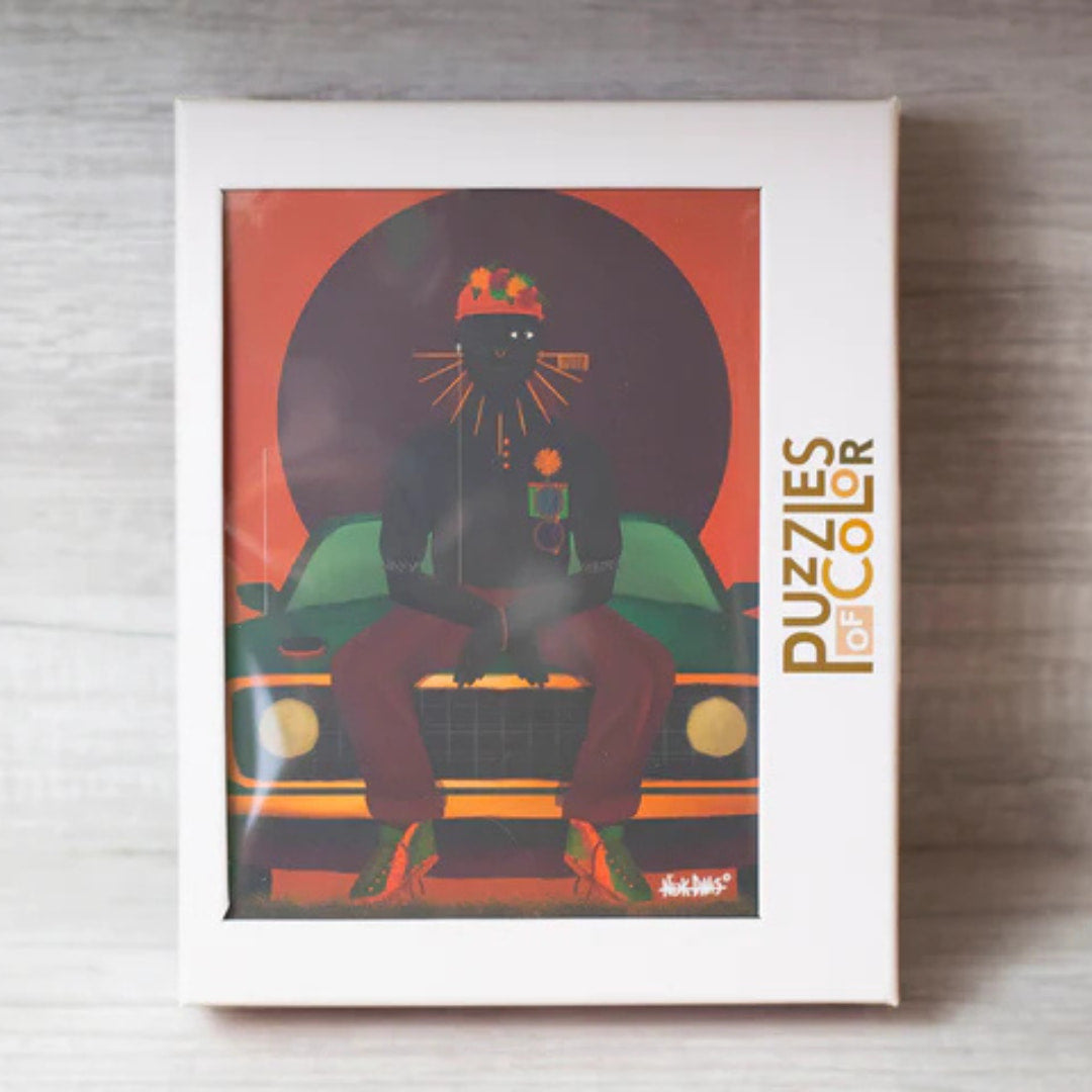 Puzzles of Color packaging with a colorful illustration on a wooden surface