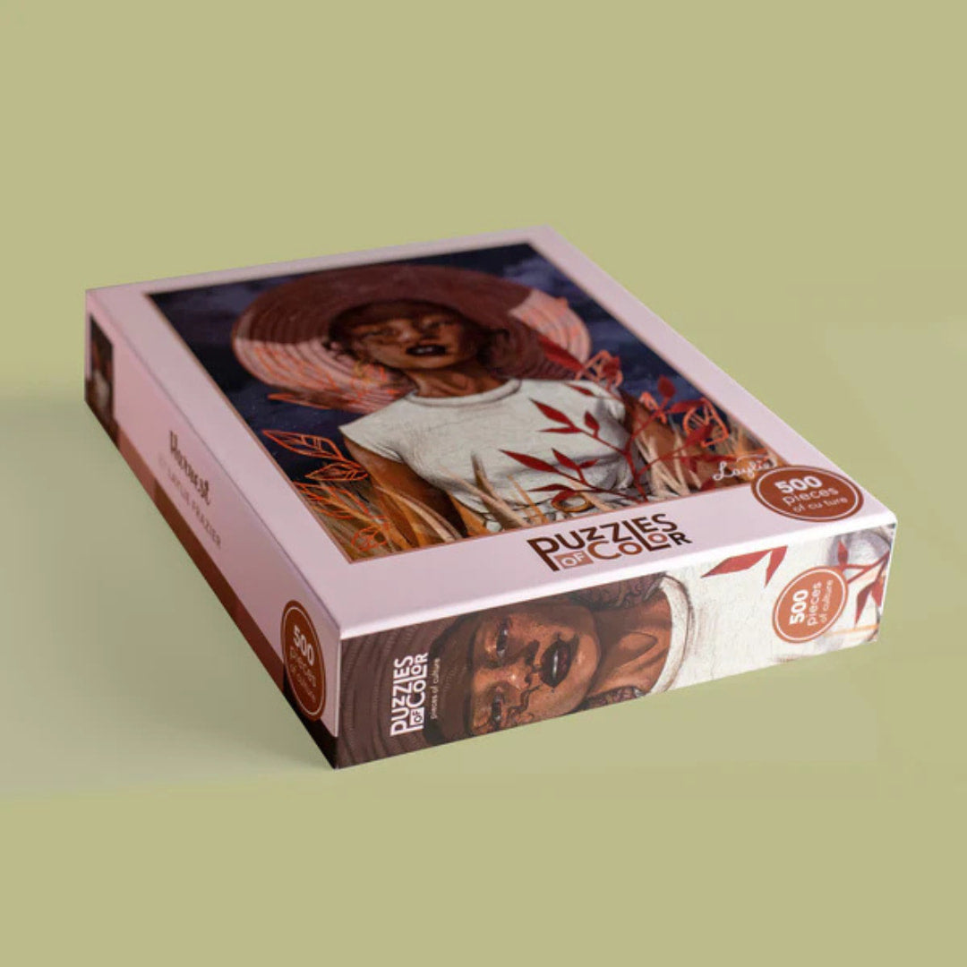 Puzzle box with a woman's face on a green background