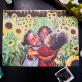 Illustration of three children hugging with sunflowers in the background on a dark surface.