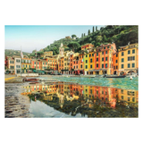 Colorful coastal town with buildings reflected in the water