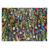 Top-down view of a floating market with boats and vendors selling goods.