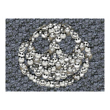 Pumpkin shaped arrangement of cartoonish jack skellington faces on a skull patterned background