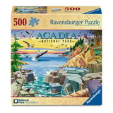 Ravensburger 500-piece jigsaw puzzle box featuring a colorful illustration of Acadia National Park with rocky cliffs, water, birds, and a lighthouse.