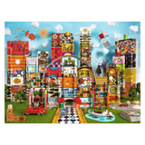 A colorful  jigsaw puzzle showing a whimsical cityscape with patterned skyscrapers, a red car, a boat, blocks spelling 'EAMES', and playful details under a blue sky.