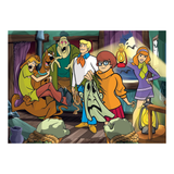 A colorful cartoon illustration of the Scooby-Doo gang in a haunted house, with the characters shown in a spooky indoor scene holding a ghost and lanterns. This appears to be the artwork itself rather than a photo of a physical product in packaging.