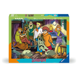 A 1000-piece Ravensburger jigsaw puzzle box featuring the Scooby-Doo gang in a spooky haunted-house scene. The box is green, orange, and blue with the Scooby-Doo logo in pink at the bottom, and the Ravensburger brand logo in the lower right corner.