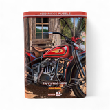 Puzzle Tin featuring an image of a red vintage motorcycle