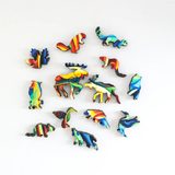 Colorful animal-shaped puzzle pieces on a white background
