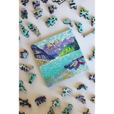 Jigsaw puzzle with a partially completed landscape scene on a white background.