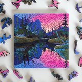 Colorful puzzle with a completed landscape scene on a white background