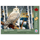 Jigsaw puzzle packaging featuring a snowy owl in a forest with 'Birds of Canada' branding.
