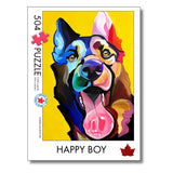 Colorful dog illustration on a puzzle packaging with 'Happy Boy' text and a yellow background.