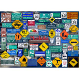 Collection of various road signs from different locations on a blue background with 'Muskoka' text.