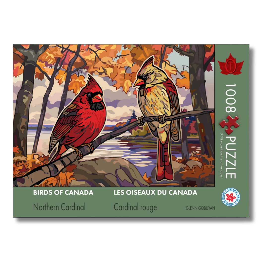 Jigsaw puzzle box featuring two cardinals in a autumn landscape with 'Birds of Canada' branding.