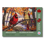 Jigsaw puzzle box featuring two cardinals in a autumn landscape with 'Birds of Canada' branding.