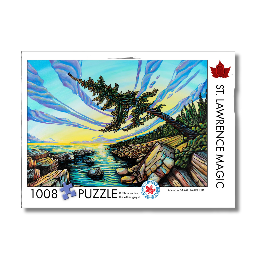 Jigsaw puzzle packaging with a scenic illustration of trees and water, featuring the brand 'St. Lawrence Magic'.
