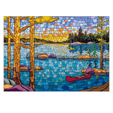 A stained-glass style landscape artwork showing a lake at sunset with trees, rocks, canoes, and a colorful sky. The scene fills most of the frame and appears to be the product itself rather than a photo of a physical object in an environment.