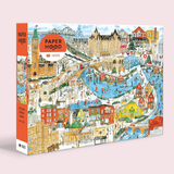 Jigsaw puzzle box with a colorful illustration of a cityscape, featuring the Ottawa Canal.