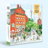A 500-piece jigsaw puzzle box by Paper Hood featuring a watercolor illustration of St. Lawrence Market in Toronto.