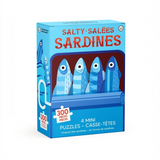 A boxed puzzle set labeled 'SALTY - SALÉES SARDINES' with illustrated blue sardines on the front, shown on a plain white background.