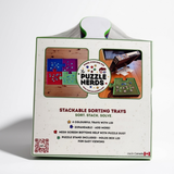 The Puzzle Nerds Stackable Sorting Trays product box, featuring a white background with green borders, product images, and descriptive text on a clean white studio background.