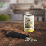 Puzzle packaging with scattered pieces on a wooden table