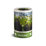 Puzzle box with black cat design on a white background