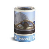 Cylindrical puzzle box with a person wearing binoculars on a white background
